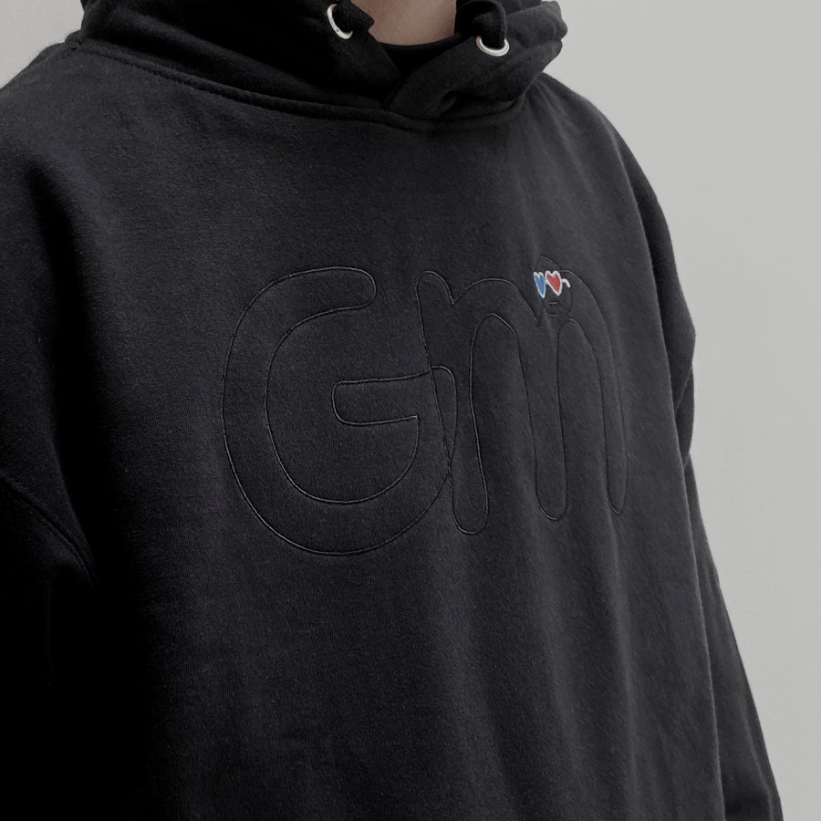 MINIMALIST BLACK-ON-BLACK GM HOODIE